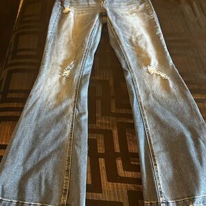 Blue Straight Leg Jeans with Distressed Details